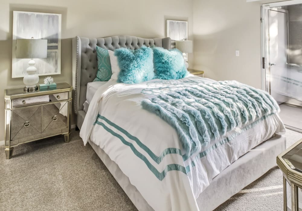 Bedroom with bright sunlight at Meridian at Stanford Ranch in Rocklin, California