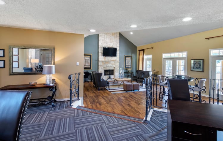 Spacious clubhouse with plenty of seating for entertaining guests at The Logan in Bedford, Texas