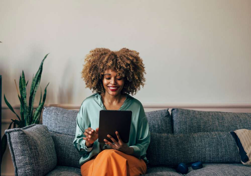 Resident using tablet at Walnut Springs in Seguin, Texas