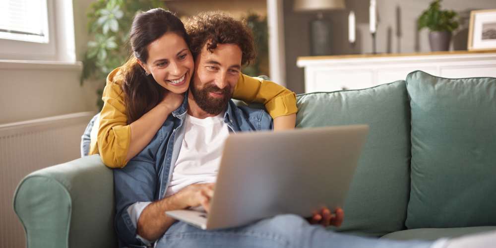 Resident accessing online rental portal at Swezy Realty in Miami Lakes, Florida