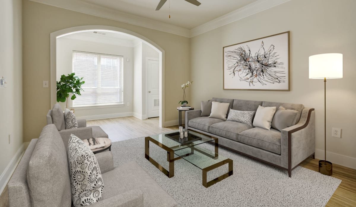 Living room with modern furnishings at Tribeca at Camp Springs in Camp Springs, Maryland