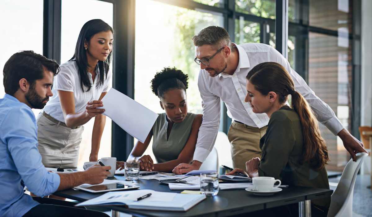 Employees working collaboratively at Perry Street Lofts in Petersburg, Virginia