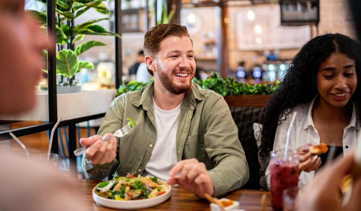 Friends enjoying a meal at a restaurant near Treehaven in Summerville, South Carolina 