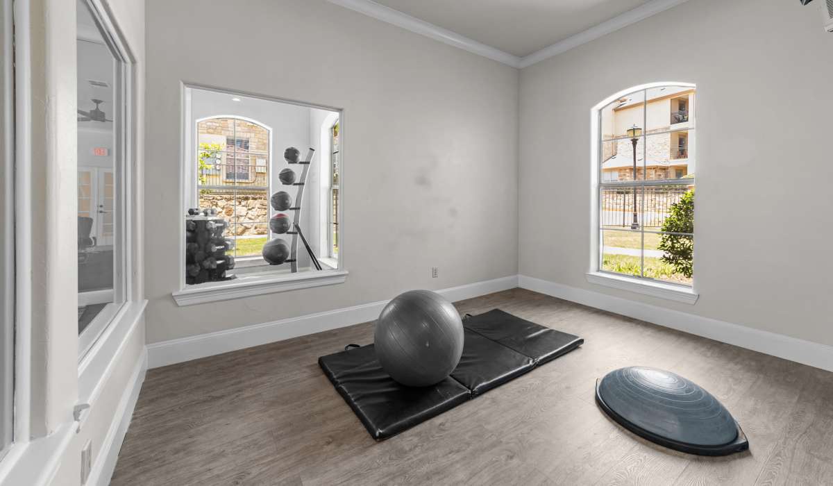 Fitness center with yoga equipments at Lebanon Ridge in Frisco, Texas