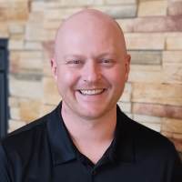 Portrait of Chris Ryan at Vista Prairie at Windmill Ponds in Alexandria, Minnesota