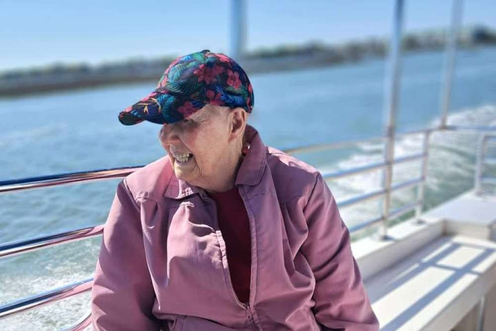 Resident doing arts and crafts at The Blake at Carnes Crossroads in Summerville, South Carolina