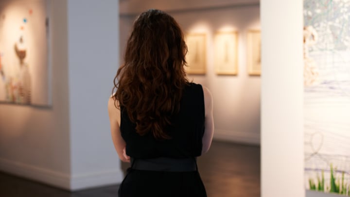 Woman in an art gallery near Redstone at SanTan Village in Gilbert, Arizona