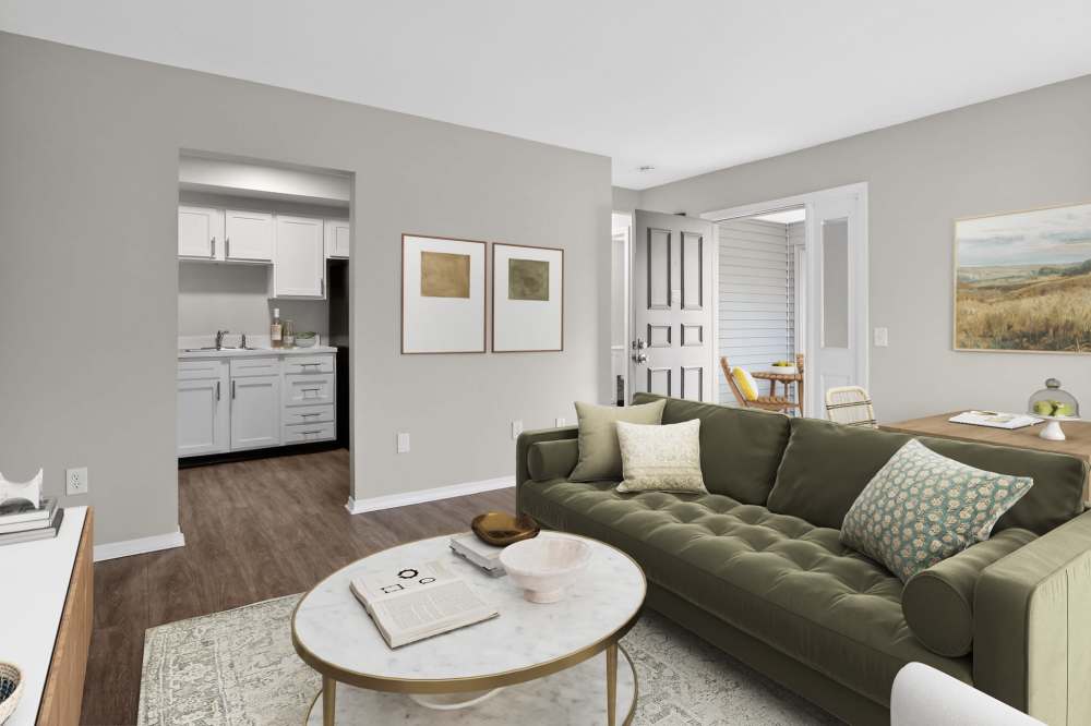 Living room with couch and coffee table at The Flats at Talcott in Weatogue, Connecticut
