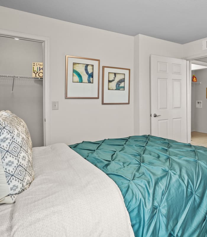 Chic bedroom with ceiling fan at Villas of Waterford Apartments in Wichita, Kansas