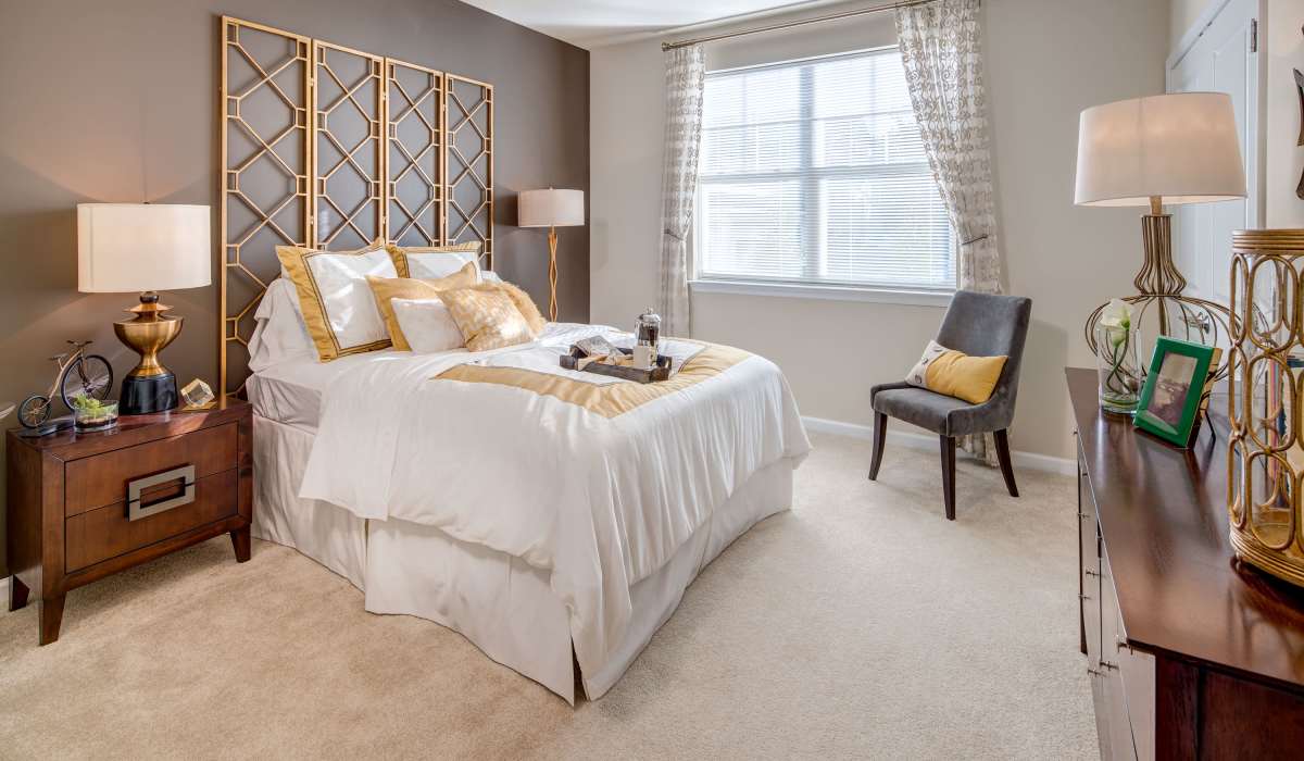 Bedroom with window and ample natural light at One Glastonbury Place in Glastonbury, Connecticut