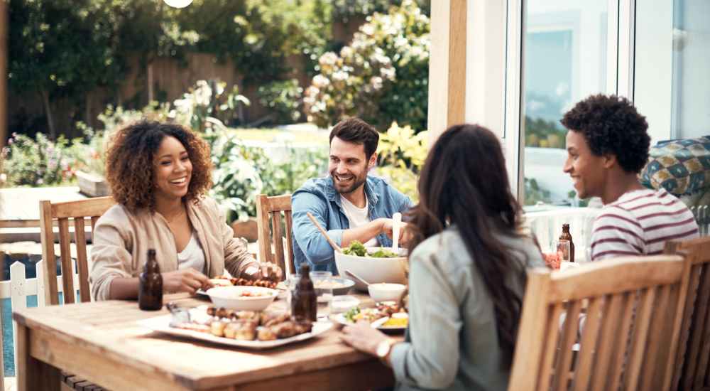 Residents enjoying their meal at a restaurant near Northwoods Apartments in Clarksville, Tennessee