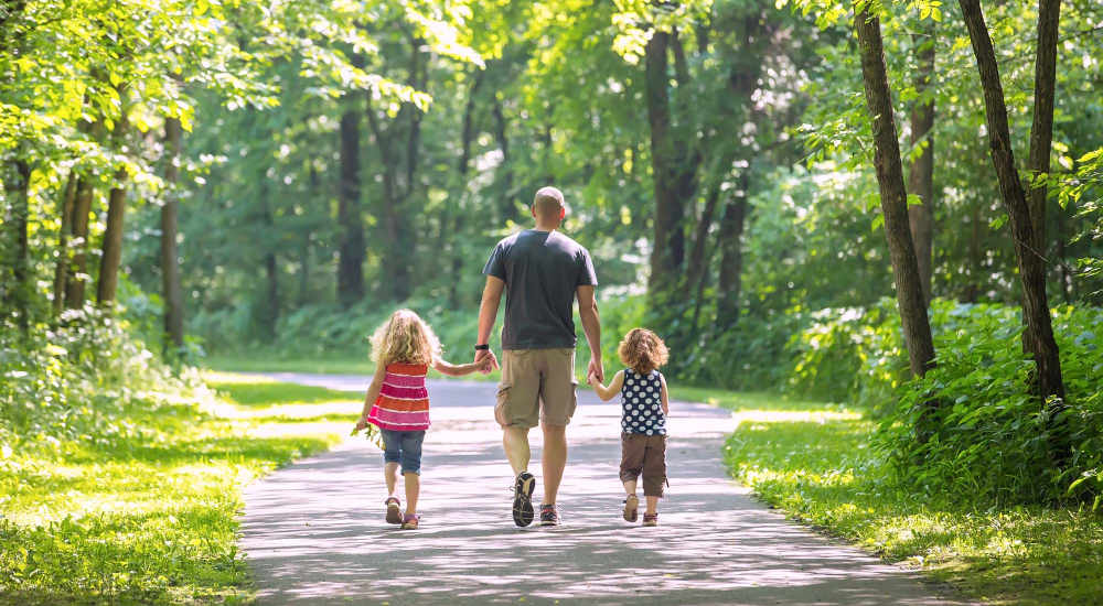 Residents having a walk at a park near Grapevine Station in Grapevine, Texas
