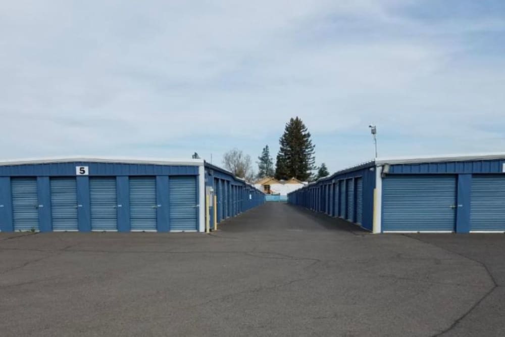 Exterior units with blue doors at BuxBear Storage Medford W Main Street in Medford, Oregon