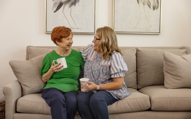 Resident couple having good time in their apartment at The Barclay at Tuckahoe in Henrico, Virginia