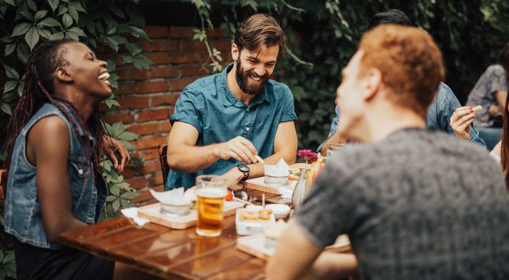 Residents having delicious food at a restaurant near 1000 Mary Apartment Homes in Iowa Park, Texas