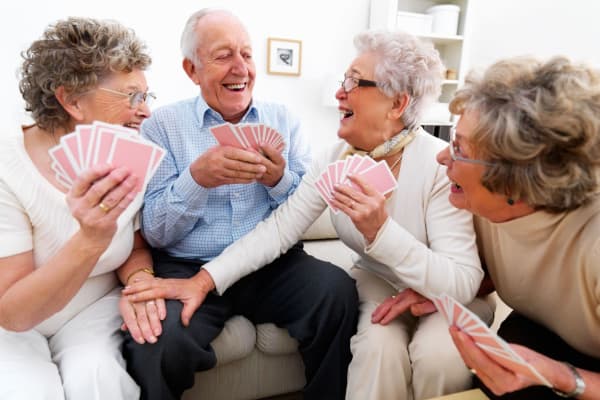 People playing cards at Brightwater Senior Living of Linden Ridge in Winnipeg, Manitoba