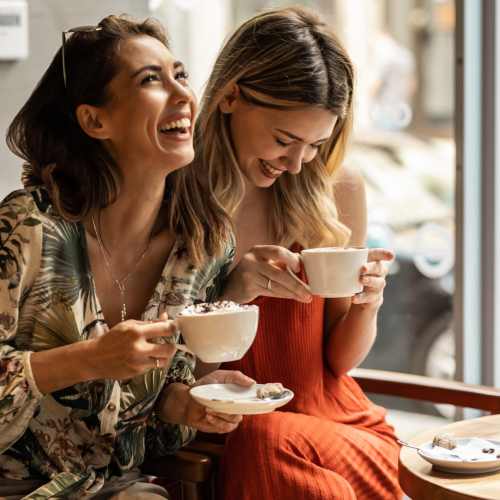 Residents enjoying coffee near Heritage Park Apartments & Townhomes in Webster, New York