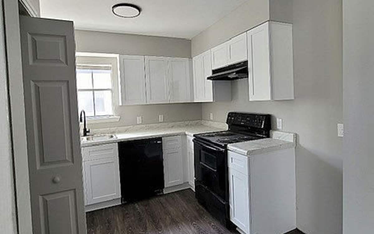 Kitchen with black color applaince at Stonebridge Manor Apartments in Gretna, Louisiana