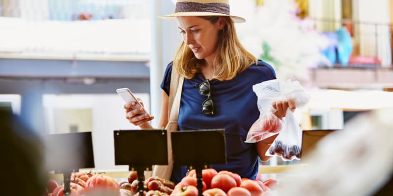 A resident buying fresh produce near Chollas Heights in San Diego, California