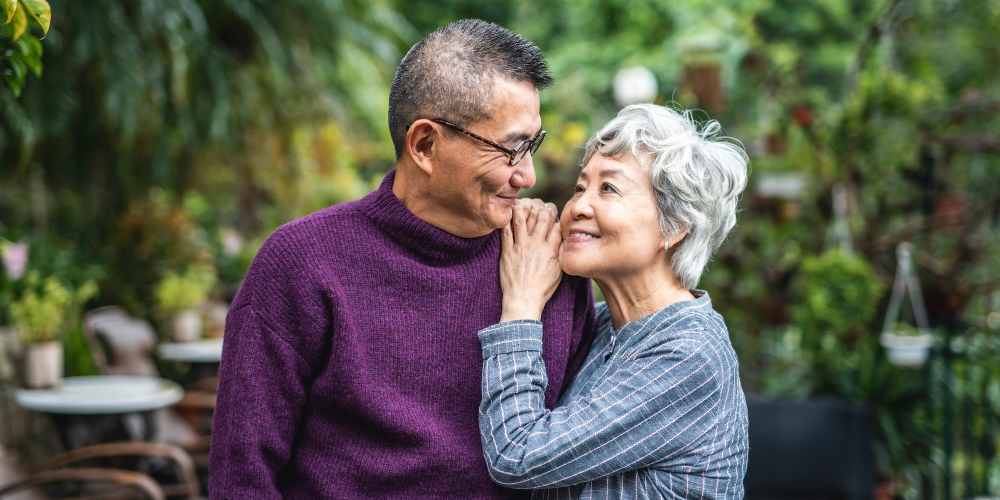 Couple hugging at The Residences at Thomas Circle in Washington, District of Columbia