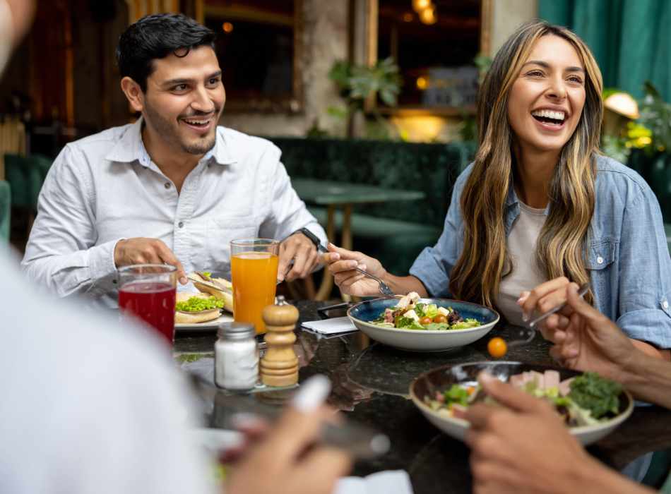 Residents eating near Breckinridge Point Apartments in Richardson, Texas