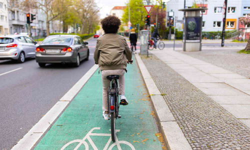 A resident rides his bike to work near Marina Breeze in San Leandro, California