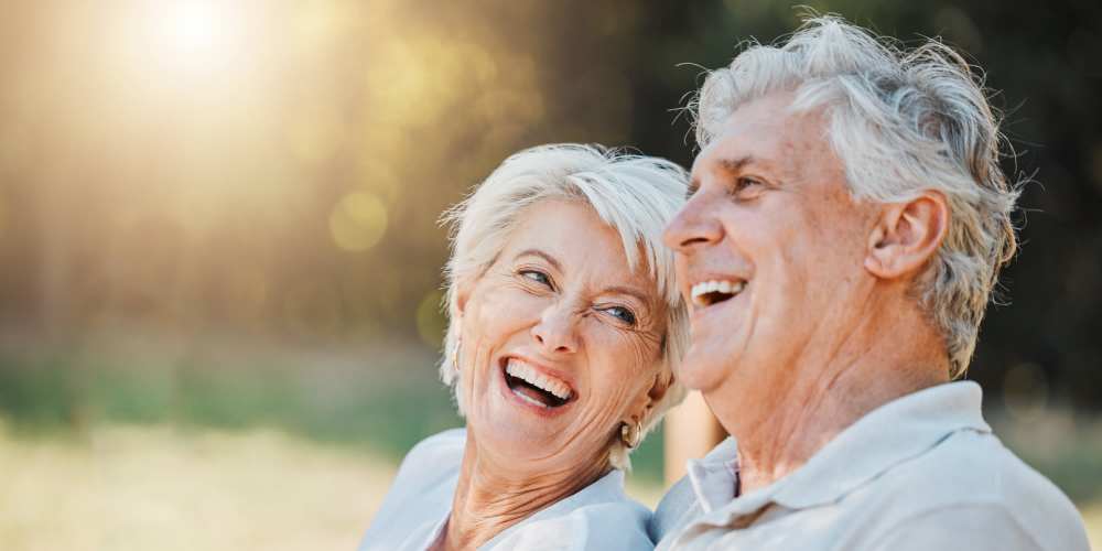 Woman sharing a laugh with her husband at Homestead Village Pensacola in Pensacola, Florida