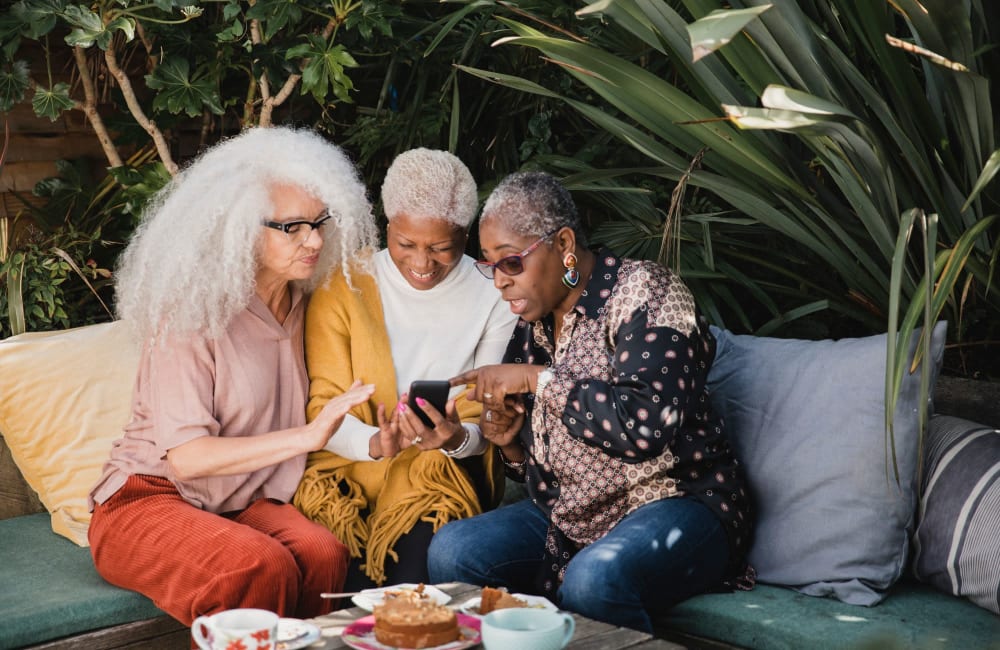 Residents  hanging outside enjoying the nice afternoon at Park Place Apartments in Sacramento, California