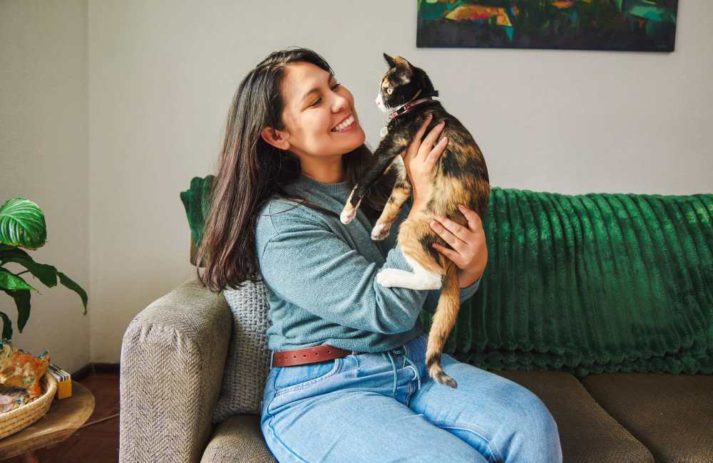 Resident playing with her cat at Buckingham Place in Austin, Texas