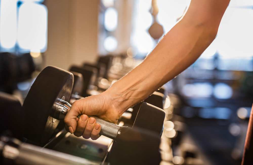 Fitness center with various equipment at Stonebridge Crossing Apartment Homes in Cordova, Tennessee