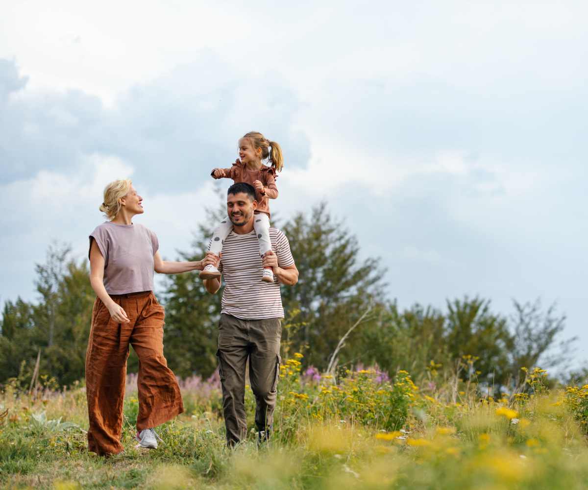 Family enjoying the outdoors near Bottineau Commons & Lofts in Minneapolis, Minnesota