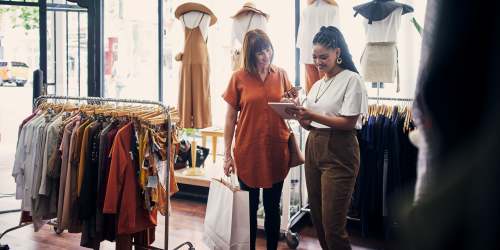 Resident shopping at a clothing store near Hunters Run in Middleburg, Florida