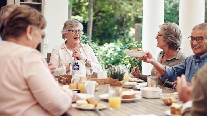 Residents eating snacks together