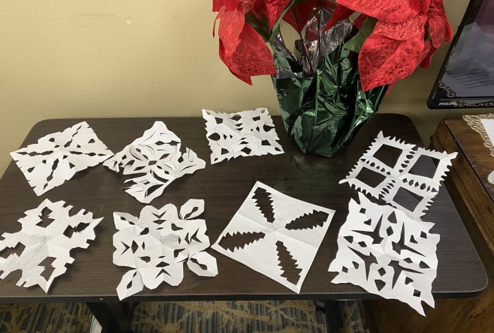 Bradenton (FL) residents filled the tables with their unique snowflake designs.