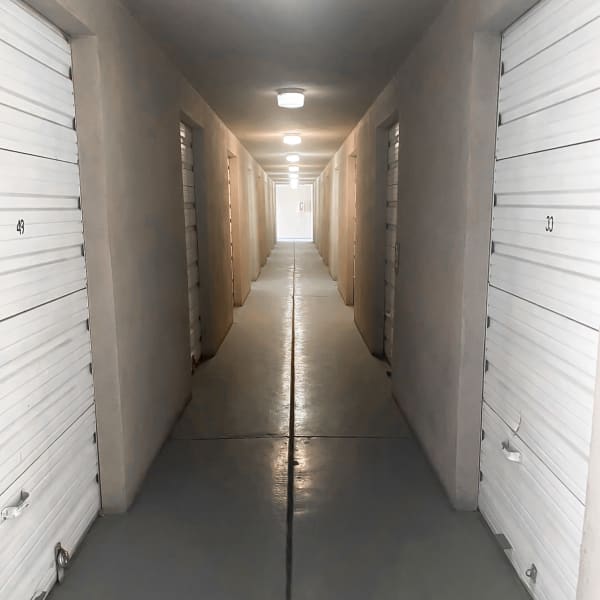 A hallway of indoor storage units at Security Storage in Sparks, Nevada