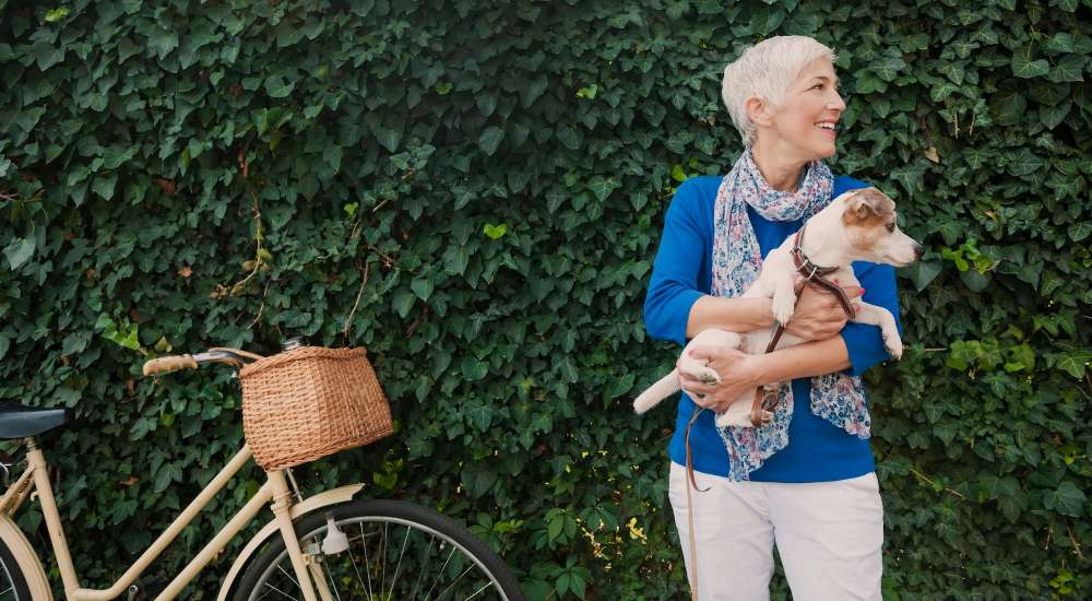 Resident playing with thier pet at New Hampshire in Los Angeles, California 
