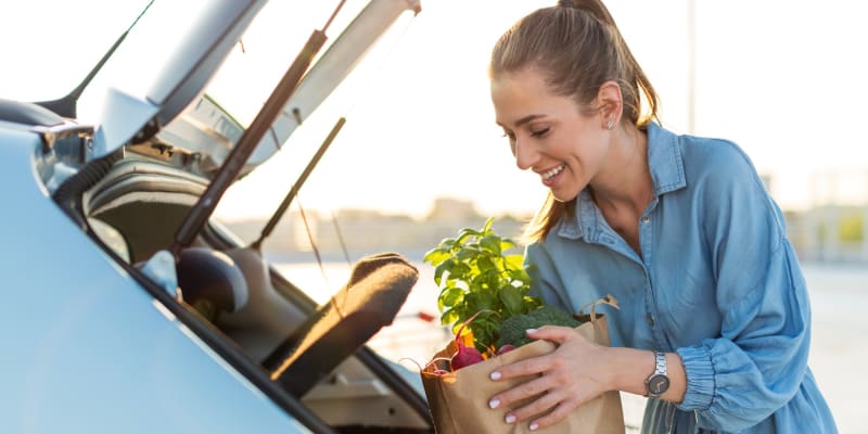 A resident loading groceries into a car near San Mateo Point in San Clemente, California