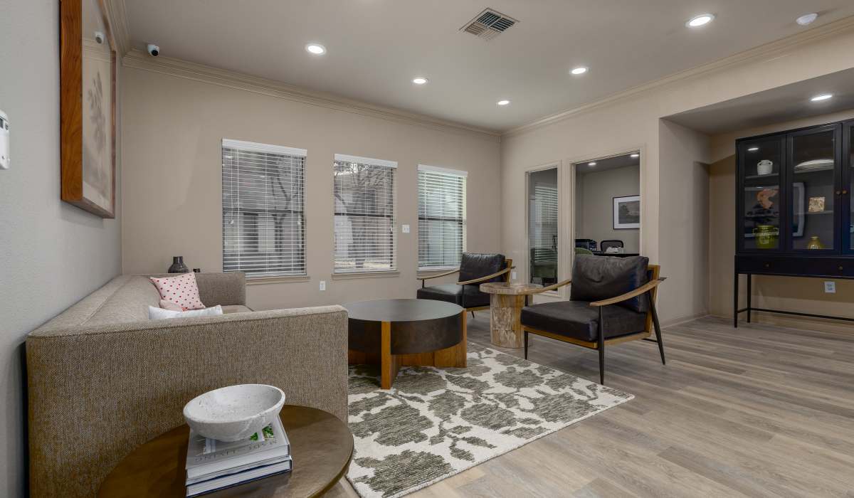 Spacious living room with hardwood flooring at Oaks of Kingwood Apartments in Kingwood, Texas