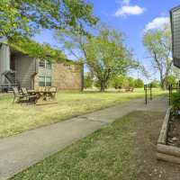 Outdoor resident dining area at Grapevine Station in Grapevine, Texas