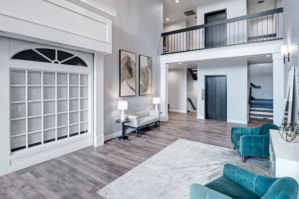 Resident clubhouse with vaulted ceilings and a large fireplace at Parkhill Luxury Apartments in Columbus, Ohio