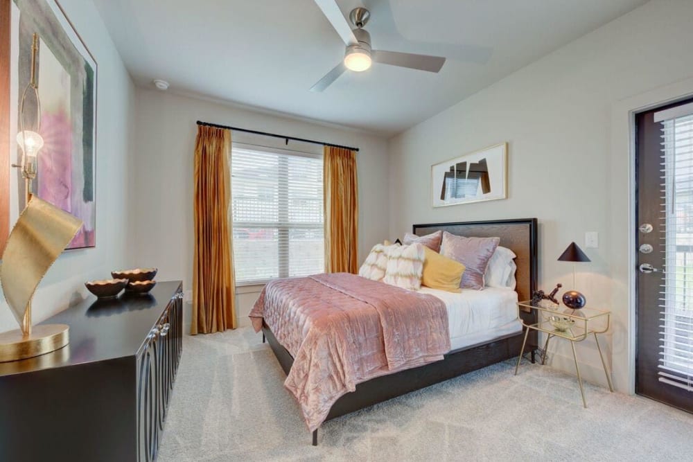 Beautifully furnished bedroom at Palmetto Pointe in San Antonio, Texas