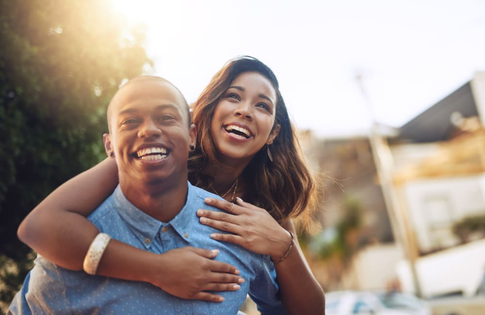 Couple happy around their new home at Park Trail Apartments in Shelbyville, Tennessee