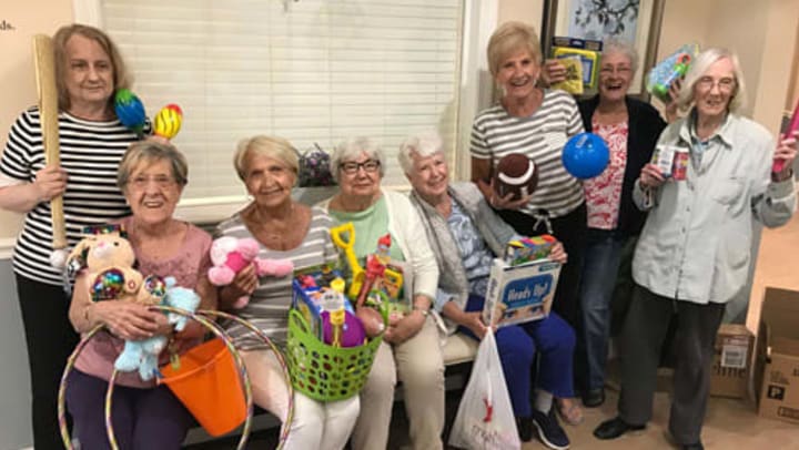 Ladies who gathered toys for children
