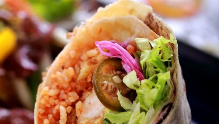 Burrito with rice and vegetables. 
