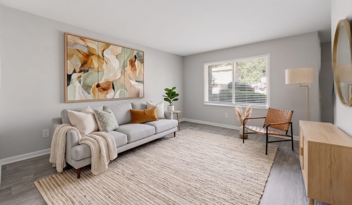 Specious living room with large window at Broadway at East Atlanta in Atlanta, Georgia