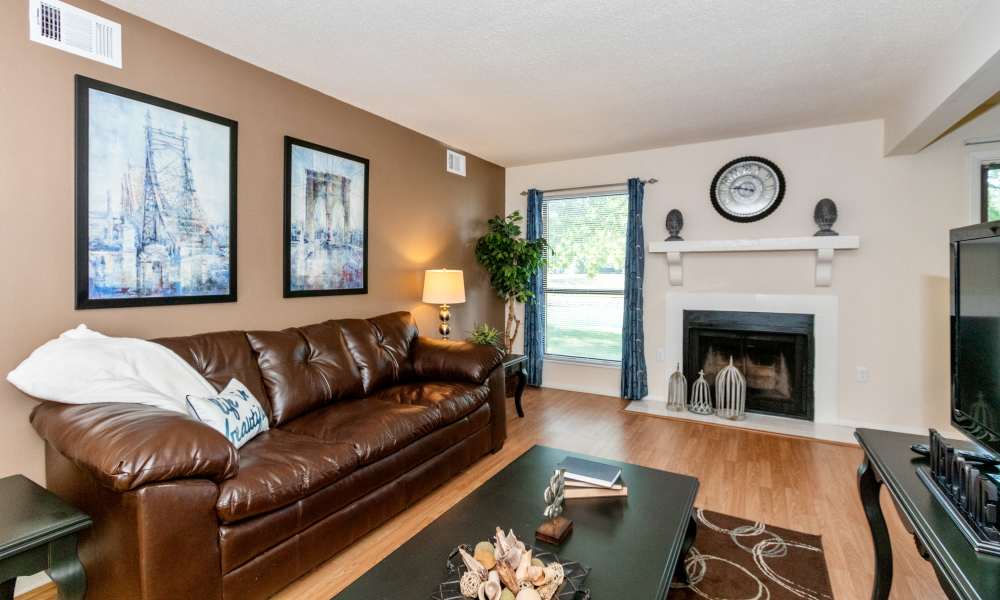 Living room with hardwood floors and fireplace
