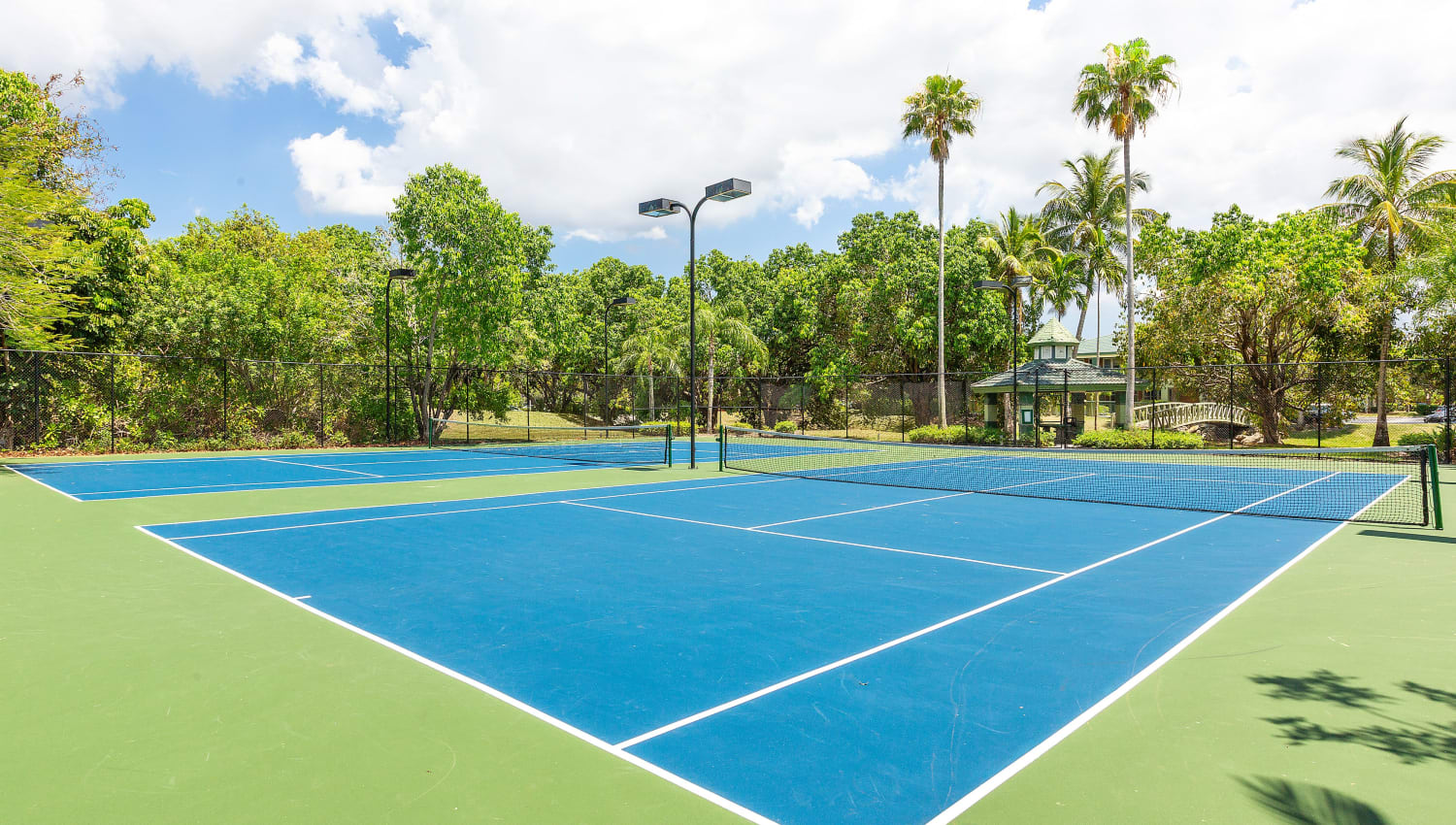 Tennis courts at Club Mira Lago Apartments in Coral Springs, Florida