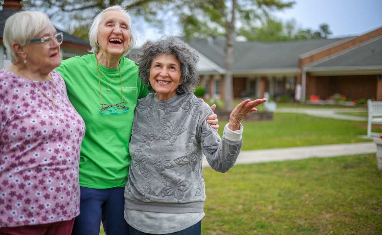 Resident friends hanging out together at Truewood by Merrill, Glen Riddle in Glen Riddle, Pennsylvania.