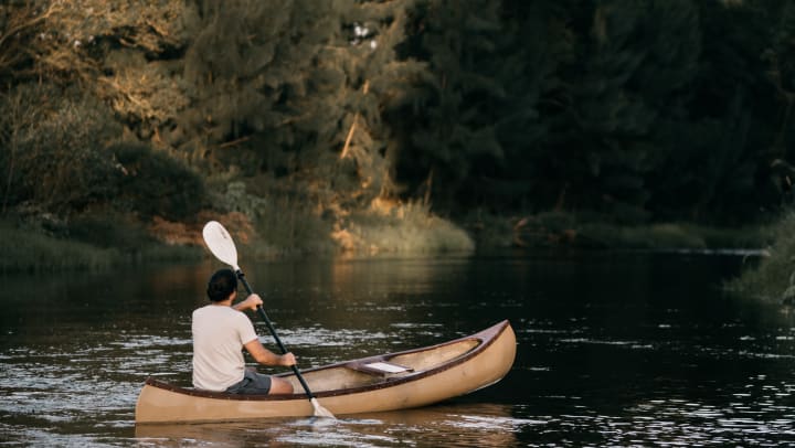 Man on a kayak in a lake