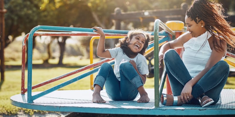 a mother and daughter at a playground near Santa Rosa in Point Mugu, California